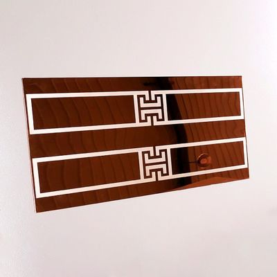 Machine de gravure laser CNC pour la décoration artistique de couleur d'hôtel sur une feuille d'acier inoxydable 304
